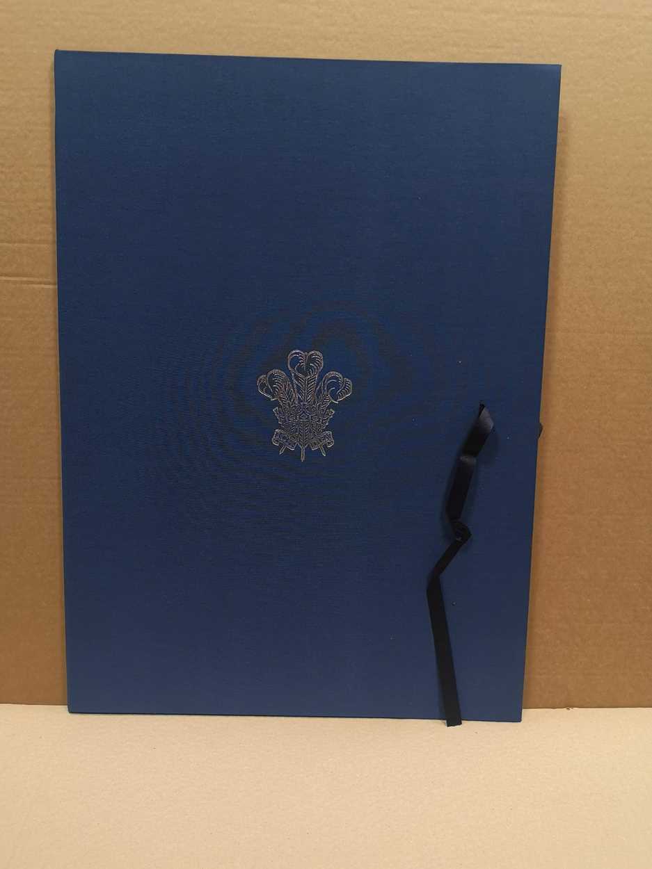 A linen bound folder to house lithographs by HRH The Prince of Wales