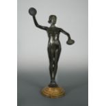 An early 20th century bronze model of a cymbal playing female nude,