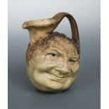 Robert Wallace Martin for Martin Brothers, a stoneware face jug, 1900,