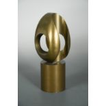 In the manner of Barbara Hepworth, an abstract bronze form,