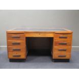 An Art Deco oak twin pedestal desk,