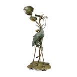 A large Art Nouveau cold painted and patinated bronze model of a stork,