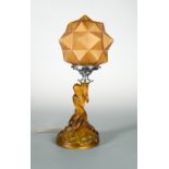 An Art Deco amber glass table lamp and shade,