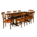 Edward Barnsley, an Australian black bean refectory dining table and twelve chairs, circa 1958,