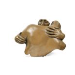 A contemporary bronzed moulded wall relief of an embrace,