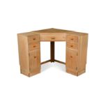 A Heal's limed oak corner desk,