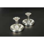 David Andersen, a pair of Norwegian metalwares dwarf candlesticks,