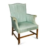 A George III mahogany library armchair,