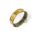 A brass dog collar, early 19th century,