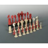 An Anglo-Indian turned and carved ivory chess set, late 19th century,