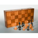 A large scale chess set in folding box, 20th century,