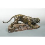 A Japanese bronze model of a roaring tiger,