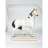 A fine and rare Leeds pottery horse, circa 1825,