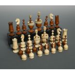 A turned bone and boxwood 'Lyon' variant chess set, 19th century,
