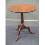 A George III mahogany tripod table, 63cm diameter