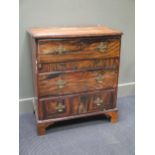 An 18th century coromandel veneered chest of drawers, with a fall front secretaire drawer over two