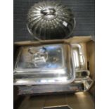 A silver plate pair of entrée dishes and other plates