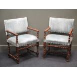A pair of 19th century country house walnut barley twist frame elbow chairs (2)