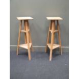 Two sculpture adjustable stands, 100 x 33cm