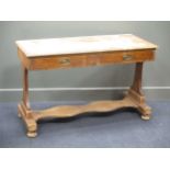 A two drawer pine side or writing table, 74 x 122 x 53cm