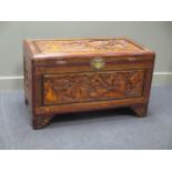A Chinese carved and stained wood chest or coffer, 61 x 100 x 52cm