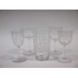 A collection of etched Edwardian glass stem ware