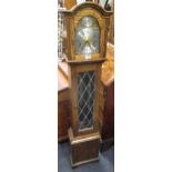 An modern oak chiming grandmother clock 151cm high