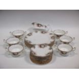 A Royal Albert dinner service, comprising of six plates, two serving dishes (One large one smaller),