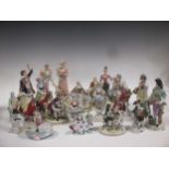 A collection of continental porcelain figurines to include Vienna and Sitzendorf (18)