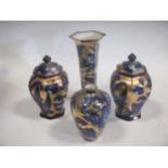 A pair of Forrester Phoenix Ware jars and covers, a similar trumpet vase and another (4)