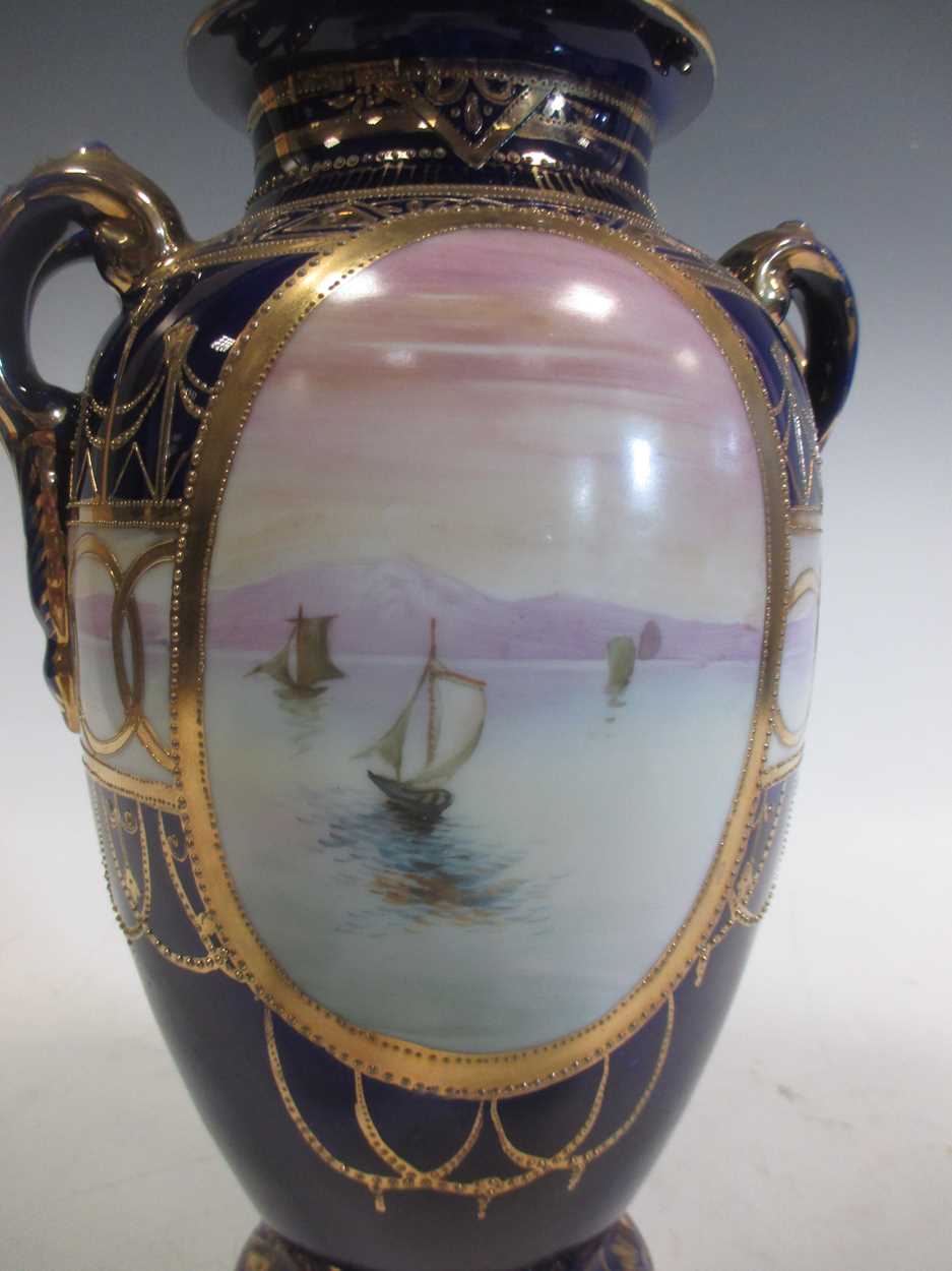 Three Noritake two-handled vases painted with sailing boats, reserved on blue ground bodies, the - Image 2 of 7
