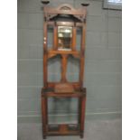 An early 20th century oak hall stand 195x 61x30cm