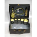 A silver and yellow guilloché enamel dressing table set within a leather case with Asprey stamp