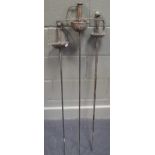 Two basket hilted rapiers with pierced bowl hilt, 116cm long, and a bowl hilt rapier (3)