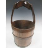 An early 19th century Irish coopered peat bucket, with fixed handle