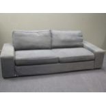 A contemporary blue upholstered three seater sofa, approx 230cm wide