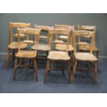 Seven late Victorian knifeback kitchen chairs