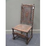 A 17th century style caned walnut chair,