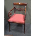 A Regency mahogany arm chair on sabre legs