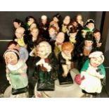 A collection of 25 Royal Doulton Charles Dickens characters