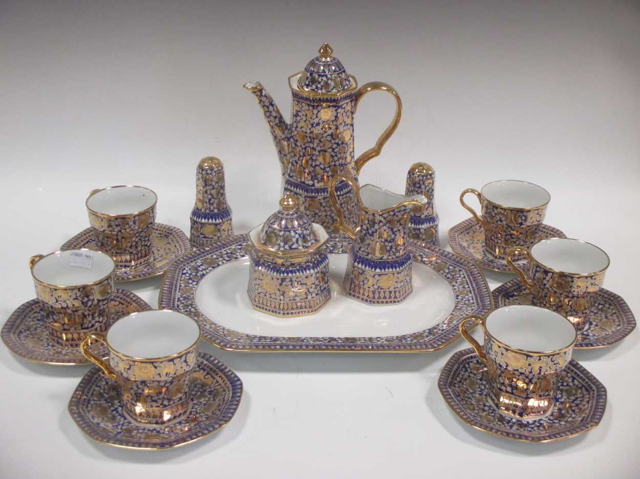 A blue and gilt porcelain coffee service