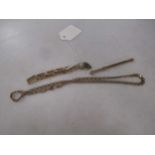 A 9ct gold gate bracelet, a 9ct gold fancy chain and a 9ct gold swizzle stick, gross weight 39.1g (