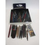 A collection of pens, to include Parker, silver examples and others (qty)