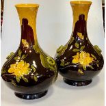 A large pair of Bretby Art Pottery vases