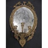 A 19th century gilt girandole mirror, 73cm high