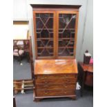 A George III mahogany bureau bookcase 238 x 107 x 59cm