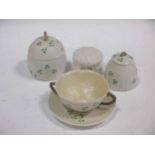 A collection of Belleek together with a Wedgwood teapot together with a green Wedgwood vase
