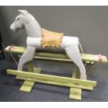 An early twentieth-century Folk-art painted rocking horse