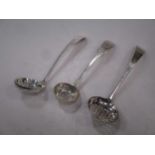 Two George III and one William IV silver sugar sifting spoons (3)