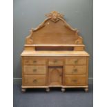 A Lincolnshire pine dresser with raised arched back, 178 x 146 x 52cm